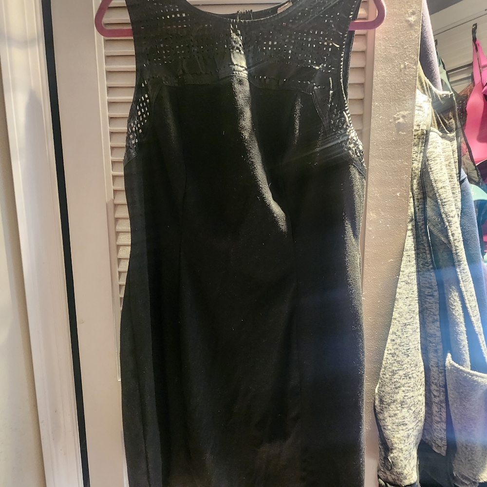 Never worn; looking to downsize wardrobe for moving purposes